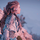 Aloy stares into the distance in Horizon Forbidden West on PS5.